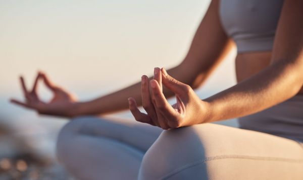 woman, hands or lotus pose meditation on sunset beach, ocean or sea in mental health, mind training or chakra balance zoom, peace or zen yogi in calm mudra, relax yoga wellness or sunrise gratitude