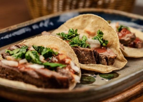 Una receta de tacos con cilantro
