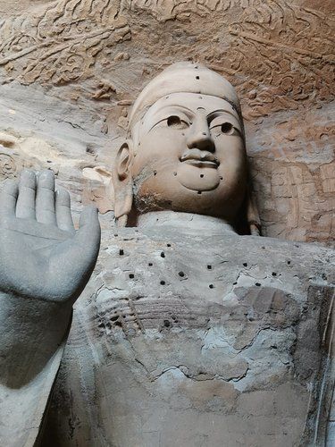 終于知道為何佛像上有那么多孔洞了