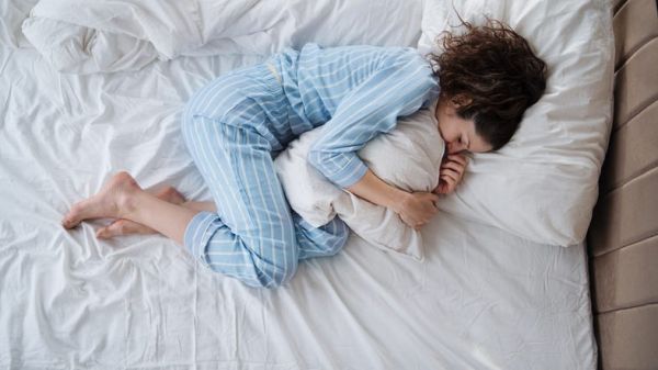 upset woman in bed