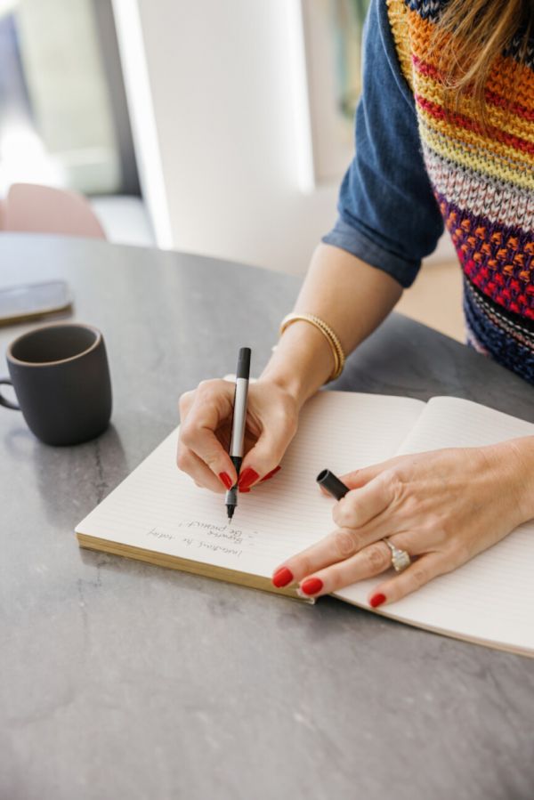 Woman writing_wellness practices