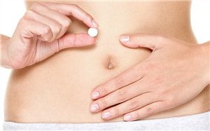 青年 女 腹部 肚子 分娩 藥片 吃藥_21198572_xxl_副本
