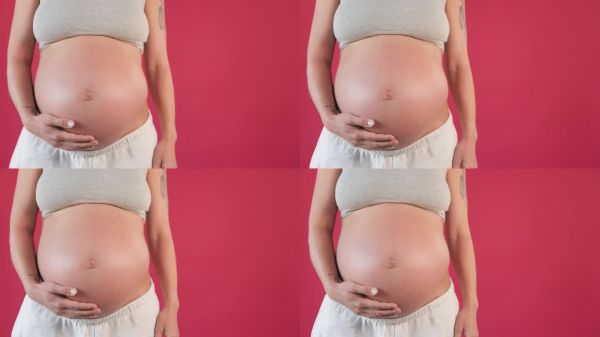 孕妇，肚子和产前健康、妇科和生育健康的工作室。女性，模拟空间和背景中婴儿的成长，腹部健康和胎儿发育。