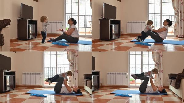 母亲和孩子在明亮的客厅里一起锻炼和建立亲密关系。