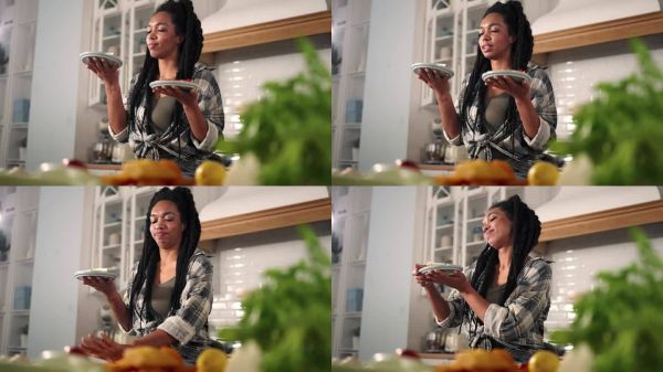 黑人女性选择不健康的汉堡，拒绝蔬菜沙拉。在素食餐和高热量快餐之间的选择，健康生活方式，年轻的非裔美国