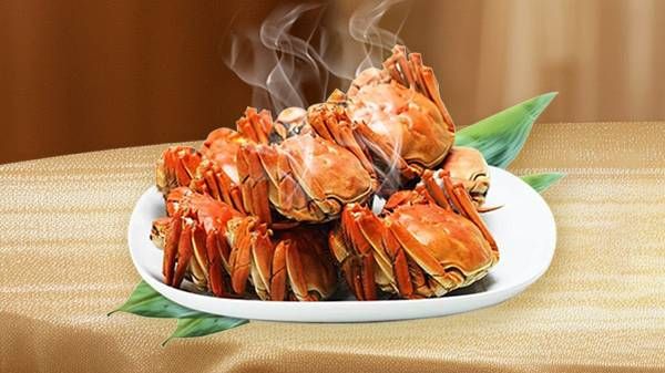 吃蟹可以喝牛奶吗