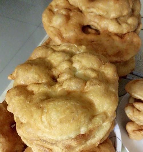 學(xué)會制作山西炸油餅，讓你的早餐更加美味（傳統(tǒng)早餐美食的制作教程）