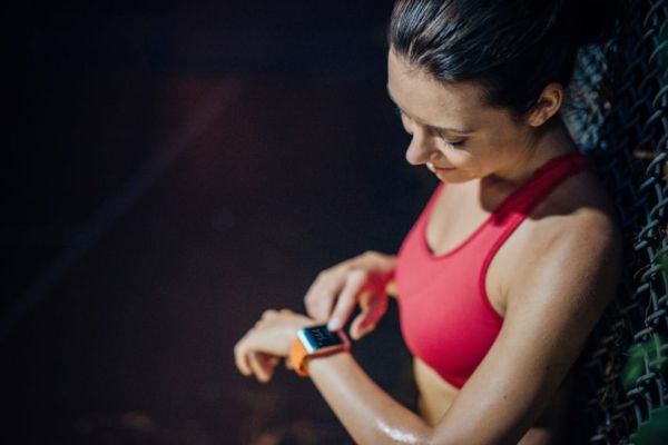 woman checking pulse