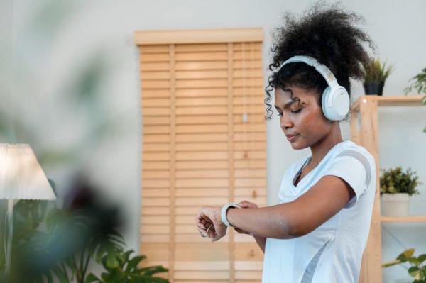 she enjoys her workout routine, always motivated by the music playing through her headphones