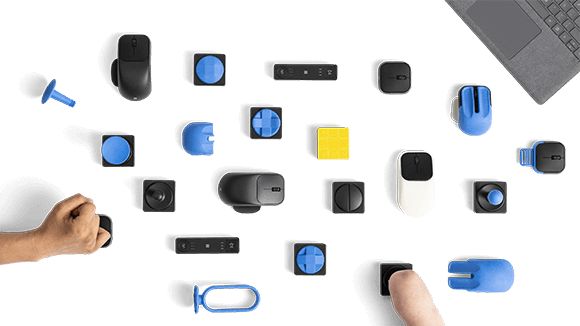 Image of all Microsoft adaptive accessories laid out in a grid pattern.