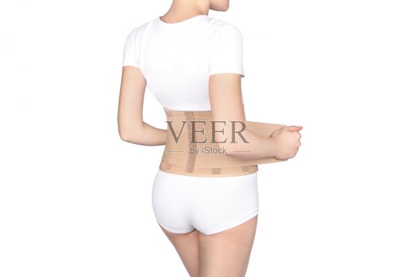 矯形腰椎支撐產(chǎn)品。腰部支撐的腰帶。背部鎖骨脊柱姿勢矯正器。腰腰支撐帶強(qiáng)有力的下背部支撐。孕婦和產(chǎn)后腰椎支架照片攝影圖片