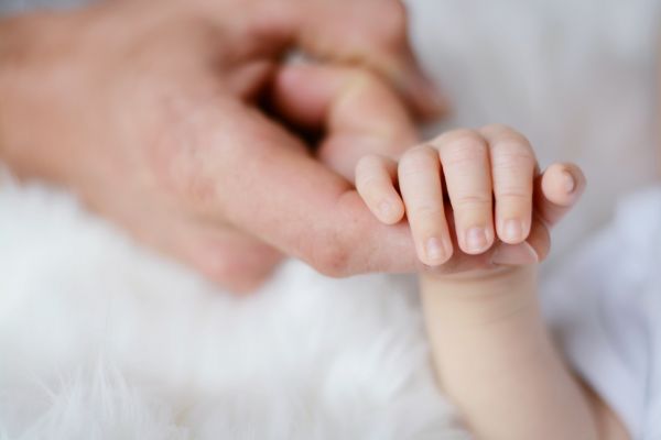 baby-holding-it-s-parent-finger-733880.jpg