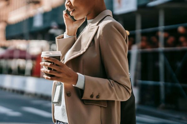 Woman walking and talking on phone