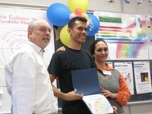 Student receiving award.