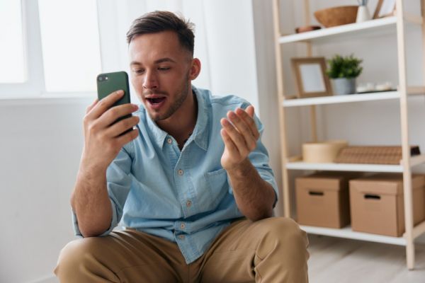Mental health goals examples: Man using AI therapist app to set and achieve his goals