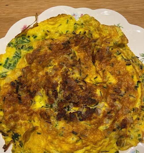 桃仁野葱炒蛋的做法（健康美味的家常小炒菜）