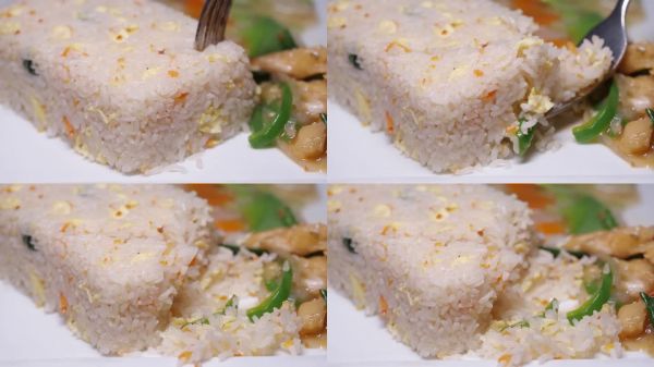 美味的炒飯配上色彩鮮艷的蔬菜和蛋白質(zhì)。