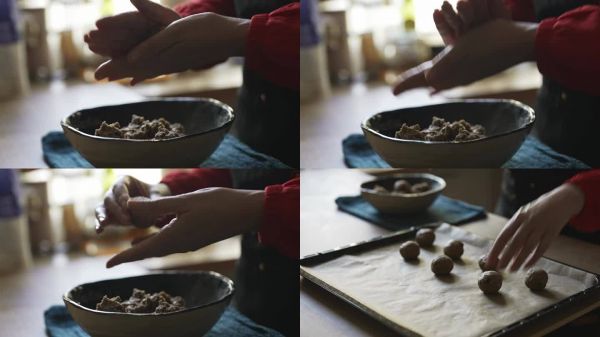 廚師正在塑形燕麥葡萄干餅干面團(tuán)球。