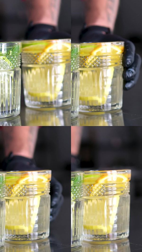 青柠薄荷鸡尾酒,玻璃杯中装有冰块和矿泉水,莫吉托无酒精。制作柠檬水,夏季饮品,冷饮,健康饮品。