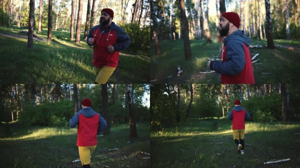 快乐的男人准备晨跑。活力四射的中年男子在公园里准备晨间锻炼。