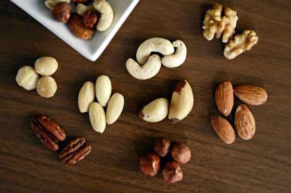 different-types-of-nuts-on-wooden-table-healthy-lifestyle-tips