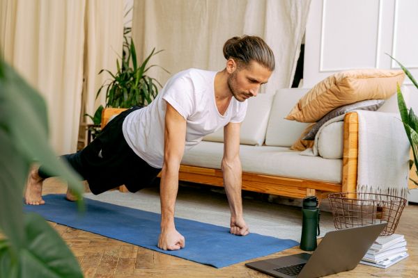 fit-man-doing-push-ups-in-his-living-room-healthy-lifestyle-tips