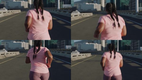 超重女性跑者在城市日落时分进行慢跑锻炼，参加减肥挑战，背影。