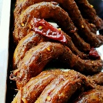 绝味鸭脖里的那个小土豆是炖的还是蒸的？